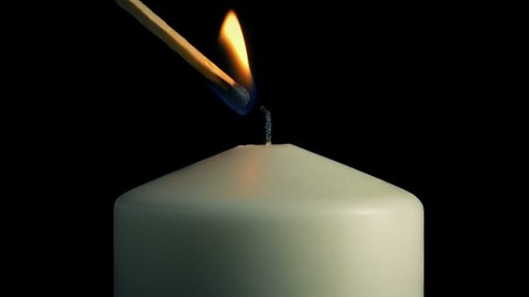 Large Candle Is Lit Closeup