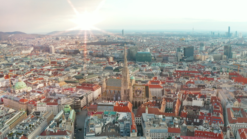 Vienna aerial skyline at sunset. Stephen's Cathedral, its history and its significance for Vienna and Austria Royalty-Free Stock Footage #1079869097