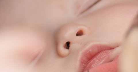 Close-up of a sleeping child's face.