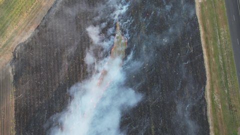 Aerial Drone shot looking down at Burning of Sugarcane at Mossman Queensland