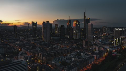 Establishing Aerial View Shot of Frankfurt am Main De, financial capital of Europe, Hesse, Germany, night evening dusk, late sunset, moody push in