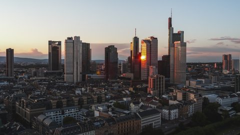 Golden Sunset, Establishing Aerial View Shot of Frankfurt am Main De, financial capital of Europe, Hesse, Germany, golden reflections, rotating