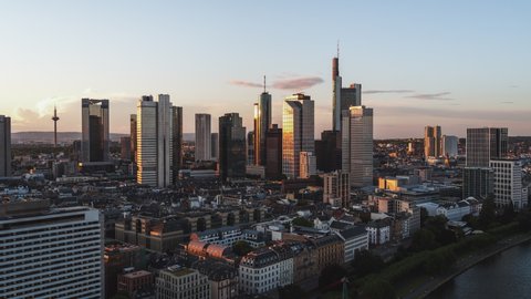 Golden Sunset, Establishing Aerial View Shot of Frankfurt am Main De, financial capital of Europe, Hesse, Germany, track in low