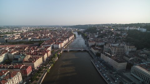 Establishing Aerial View Shot of Lyon Fr, Auvergne-Rhone-Alpes, France, pull back, old town, bridges
