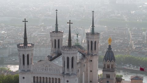 Lyon, France - circa 2021, Establishing Aerial View Shot of Lyon Fr,  Auvergne-Rhone-Alpes, France, amazing needles of Basilica of Notre Dame de Fourviere, paralaxe shot