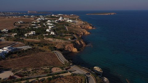 Aerial coastline in Paros island in Greece with Filitzi island in background