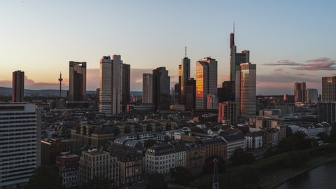 Golden Sunset, Establishing Aerial View Shot of Frankfurt am Main De, financial capital of Europe, Hesse, Germany, long low push in