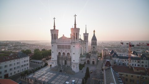 Lyon, France - circa 2021: Establishing Aerial View Shot of Lyon Fr, Auvergne-Rhone-Alpes, France, Basilica of Notre Dame de Fourviere, superb blissful light