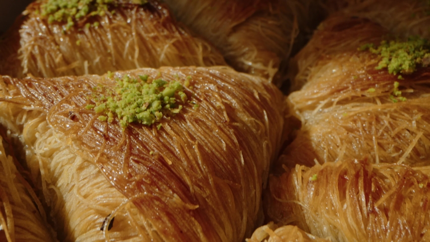 Baklava traditional Turkish dessert served on a tray | Shutterstock HD Video #1079898587