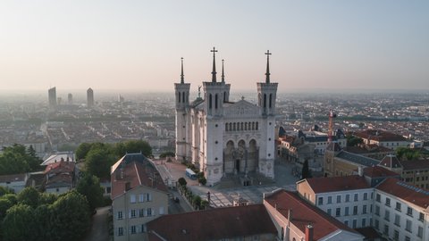 Lyon, France - circa 2021: Establishing Aerial View Shot of Lyon Fr,  Auvergne-Rhone-Alpes, France, morning light on Basilica of Notre Dame de Fourviere, superb view