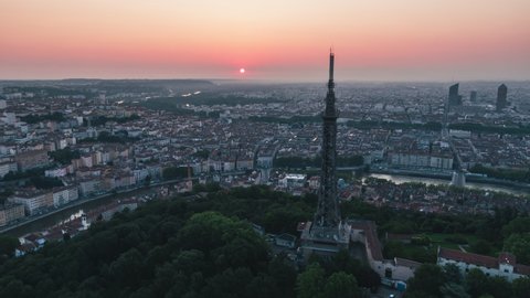 Establishing Aerial View Shot of Lyon Fr,  Auvergne-Rhone-Alpes, France, dawn sun rise in Lyon, mini Eiffel Tower