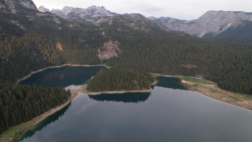 Aerial view of the Black Lake or Crno jezero , northern Montenegro. It is a glacial lake on the Mount Durmitor, on an altitude of 1,416 m. Black lake in Durmitor national park near Zabljak, Europe