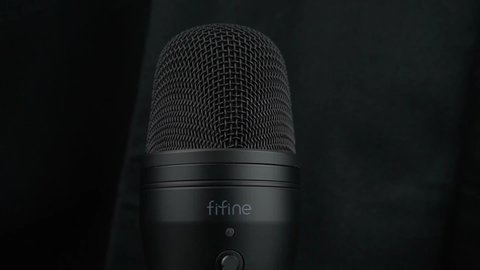 Medan, Indonesia - 5th September 2021: Black condenser microphone for professional recording from FIFINE K690