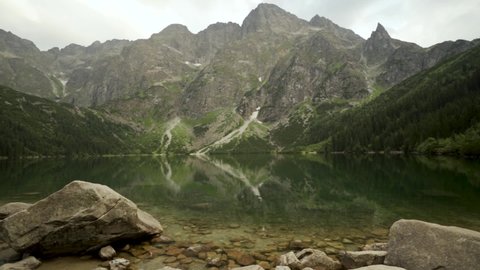 Pan shot of Polish Tatra mountains Morskie Oko lake with crystal water located in Zakopane, South Poland, Europe