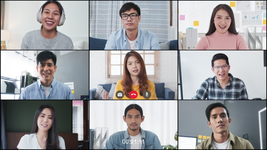 Group of young Asian business people, office coworker on video online conference call, remote team meeting. Work from home, internet communication technology, coronavirus social distancing lifestyle | Shutterstock HD Video #1079927759