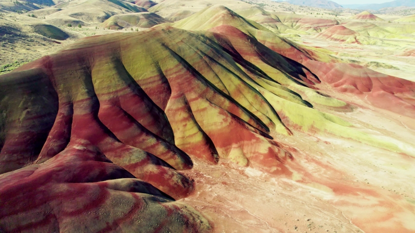 Aerial view of Painted Hills, Oregon, USA. Colorful mountains and bizarre landscapes from bird