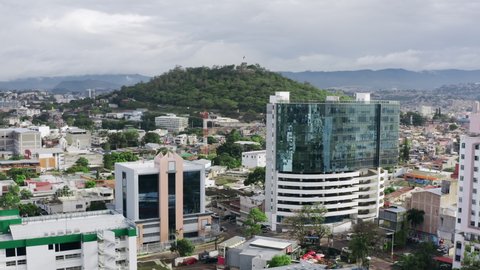 Tegucigalpa, Honduras - September, 2020: Aerial view Tegucigalpa Honduras. Downtown cityscape with high-rise buildings and streets, mountains and peaks.