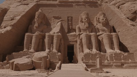 The Entrance Of Abu Simbel Temple With Osiris Statues.