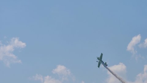 Maribor Airshow Slovenia AUGUST, 15, 2021 Extreme aerobatic maneuver in flying exhibition by a propeller plane. MX Aircraft MXS by Veres Zoltan