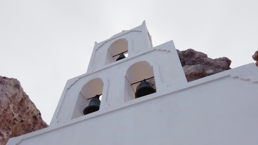 The greek-orthodox chapel of Agios Nikolaos located on the rim of the volcanic caldera on the island of Santorini in Greece near The Heart of Santorini