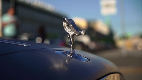 SAINT-PETERSBURG, RUSSIA - AUGUST 19, 2020: Rolls-Royce car logo on hood black luxury automobile