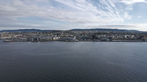 Panorama Of Trondheim City View From Serene Ocean, Trondheim Fjord In Central Norway. Aerial Drone