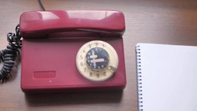 4K Vintage Retro Rotary Phone, man picks up the phone - Powered by Shutterstock - Get 15% off with code: PIKWIZARD15