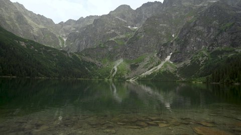 Static shot of Polish Tatra mountains Morskie Oko lake with crystal water located in Zakopane, South Poland, Europe