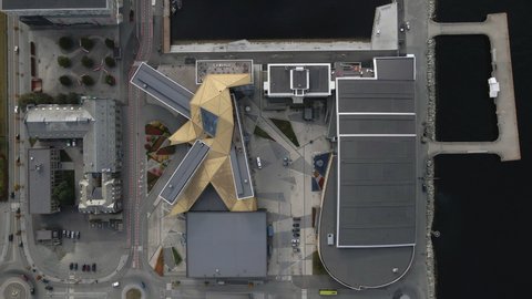 Modern Designed Hotel Building At The Trondheim Port In Norway Near The Marina. aerial top-down
