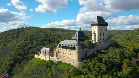 The Karlstejn castle from above. Royal palace founded King Charles IV. Amazing gothic monument in Czech Republic, Europe. 