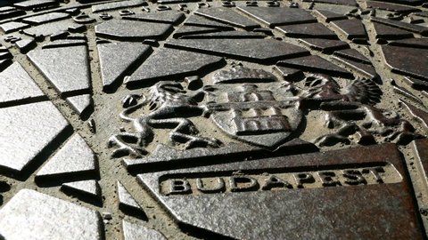 Budapest blazon illustrated on the metal sewer hatch 