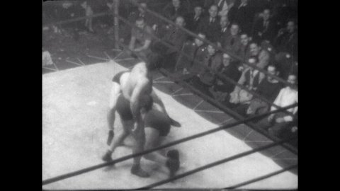 1940s: Wrestler body slams and pins opponent. Referee counts the pin and wrestlers continue to brawl.