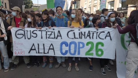 Europe, Italy , Milan October 2021 - Friday for Future Youth 4 Climate - student demonstration against climate change and global warming - Greta Thunberg e Vanessa Nakate between protesters - cop 26
