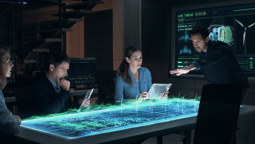Team Meeting of Renewable Energy Engineers Working on Design of Innovative More Efficient Wind Turbines. Group of Specialists Gathered Around Holographic AR Table. Wind Farm generating Green Energy.