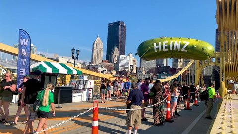 Pittsburgh , Pennsylvania , United States - 08 21 2021: Cityscape of Pittsburgh’s famous Picklesburgh pickle festival. American food festival of Pickle