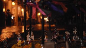 close-up of an altar of the dead on a night with lightning during the celebration of the Day of the Dead in Mexico with skulls - Powered by Shutterstock - Get 15% off with code: PIKWIZARD15