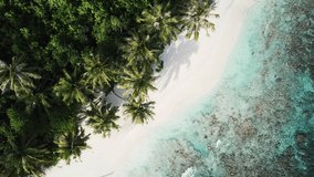 Aerial view of tropical island, Maldives. High quality 4k footage