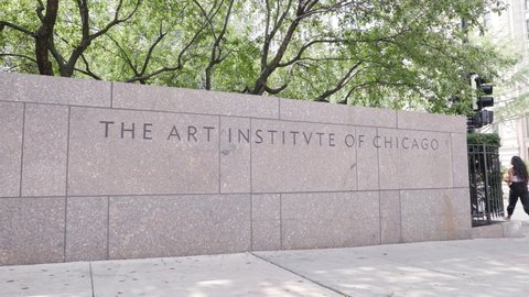 CHICAGO, IL - AUGUST 27 :  The Art Institute Chicago sign on sidewalk barrier, Illinois on August 27, 2021.