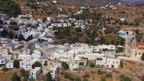 Beautiful Lefkes village in Paros island in Greece with the big church. Aerial view