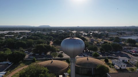 aerial view ball shaped water tower reservoir to help water distribution during peak times