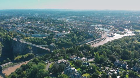 Aerial drone shot of Clifton Suspension Bridge, Bristol city and River Avon on sunny summer's day