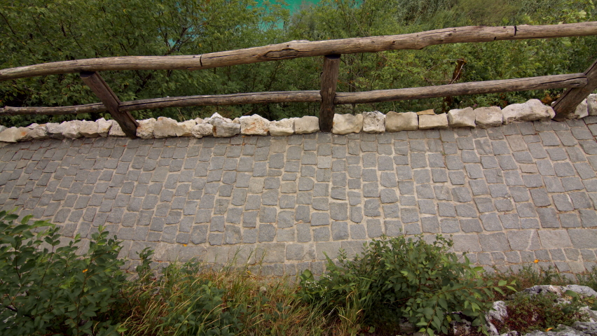 Attractive traveler walking in Plitvice National Park in Croatia