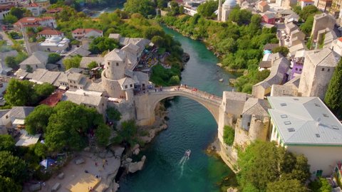 Aerial Of Reconstructed Mostar Bridge At The Historic City Along Neretva River In Bosnia and Herzegovina.