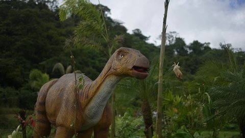 alajuela , alajuela , Costa Rica - 09 12 2021: animatronic dinosaur in the moving jungle
