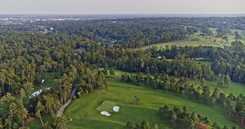 Augusta Georgia Aerial v18 cinematic establishing shot drone forward flying capturing the massive golf course at national golf club - Shot with Inspire 2, X7 camera - October 2020