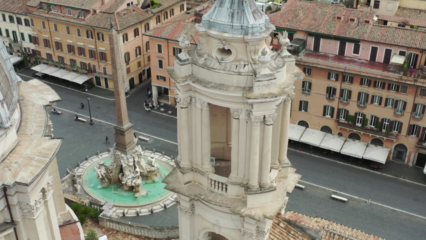 Bernini's Fountain of the Four Rivers at Piazza Navona in Rome, Italy.
Aerial view from above on the famous fountain in Rome. Center city of Roma, Italy. | Shutterstock HD Video #1080104075