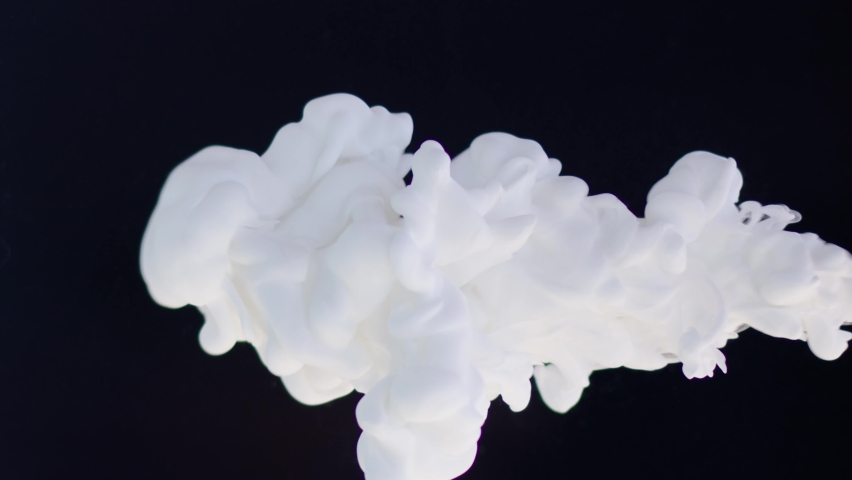 White paint drops in water on a black background, abstract and beautiful wave of ink. 8K downscale, slow motion. Filmed on cinema camera, 4K. | Shutterstock HD Video #1080122210