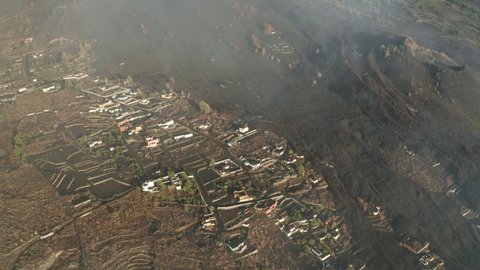 4K drone aerial shot of damages caused by Cumbre Vieja Volcano Eruption In La Palma Canary Islands September 2021