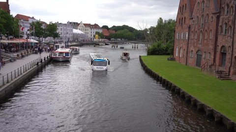 Luebeck, Germany - July 20, 2021 -non-traditional tour of the city by bus by road and river 