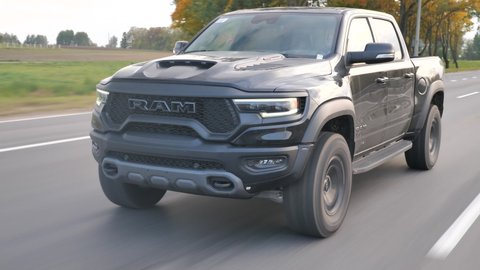 Minsk, Belarus - September 10, 2021: Dodge Ram TRX drives on a highway. Ram TRX is the most powerful series production pick-up. Its 6,2-liter Supercharged V8 delivers 702 hp.